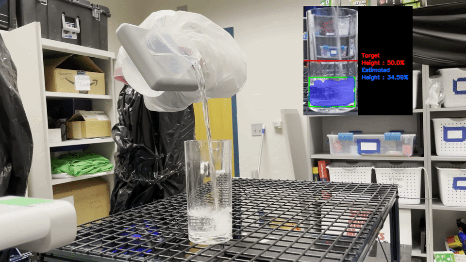  A robotic arm at the top of the screen is draped in a plastic bag and pours water from a beaker it's holding into a clear glass on a table.